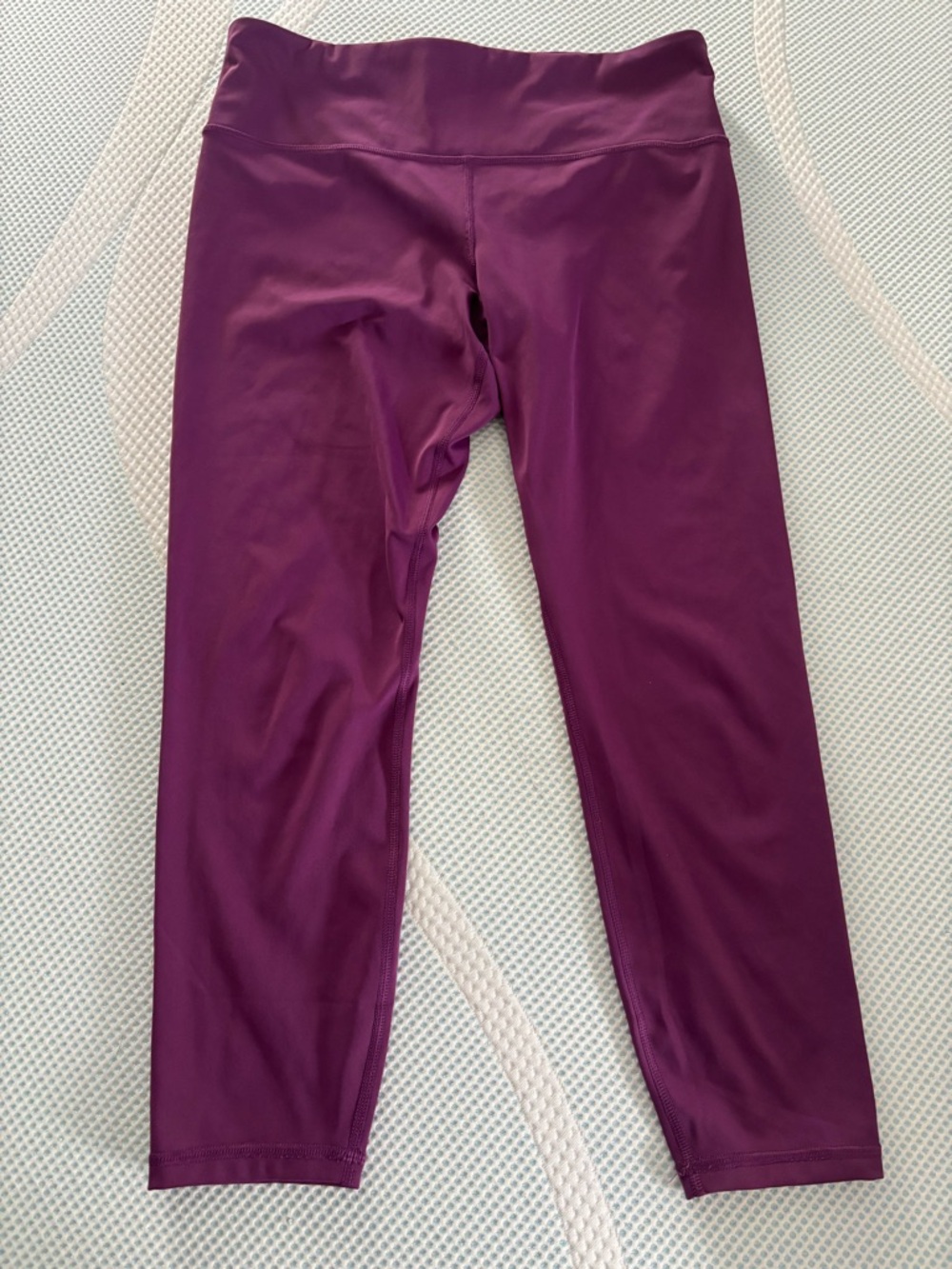 Woman’s Athleta purple leggings (L)